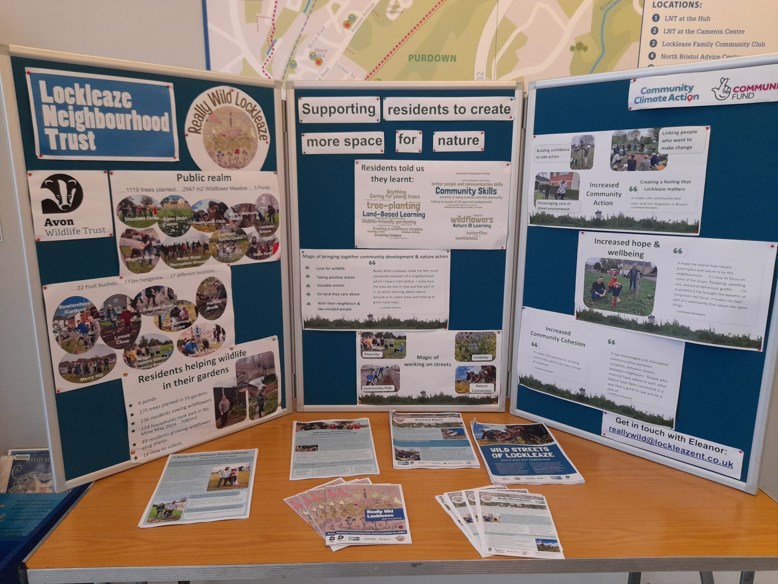 a display board about really wild lockleaze nature recovery project with stats about what residents have learnt, how much has been planted and lots of pictures