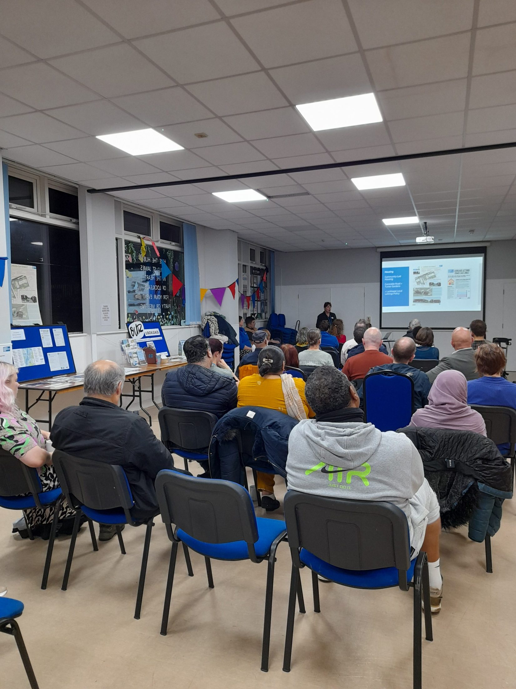 an audience look at a presenter